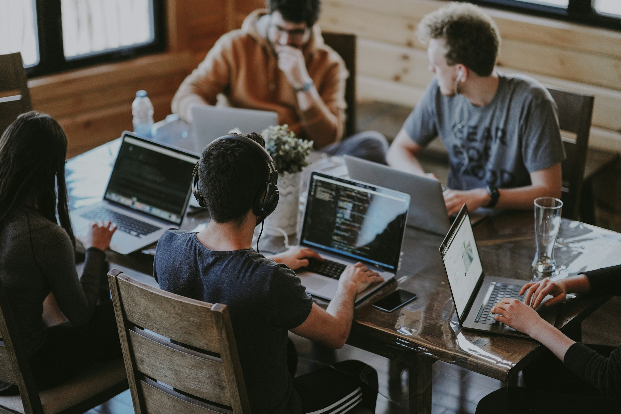 A team in conversation, the kind of small operations that benefits from one customer view across channels.