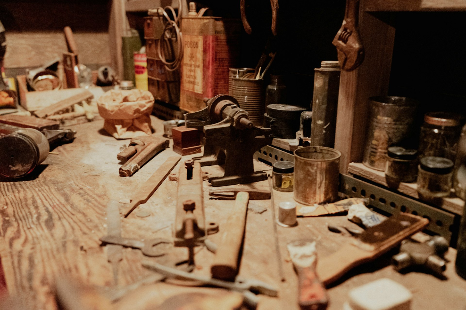 A workbench with tools laid out neatly, the visual of the operational discipline self-hosting requires.